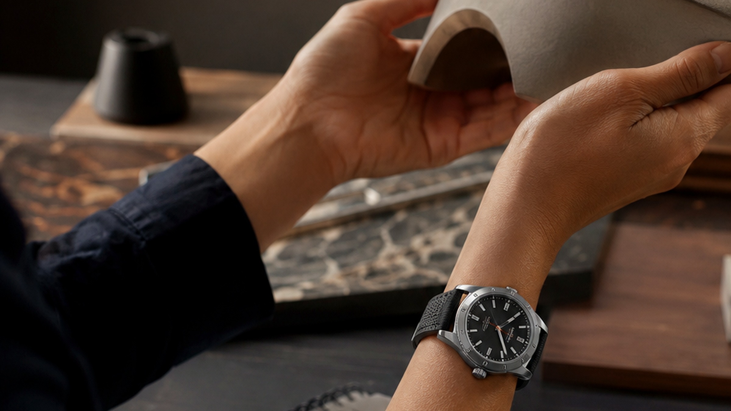 Designer wearing a Prototype watch while working